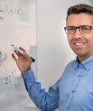 Morten Ørregaard Nielsen at the white board with mathematical calculations Photo: Lars Kruse / Aarhus University