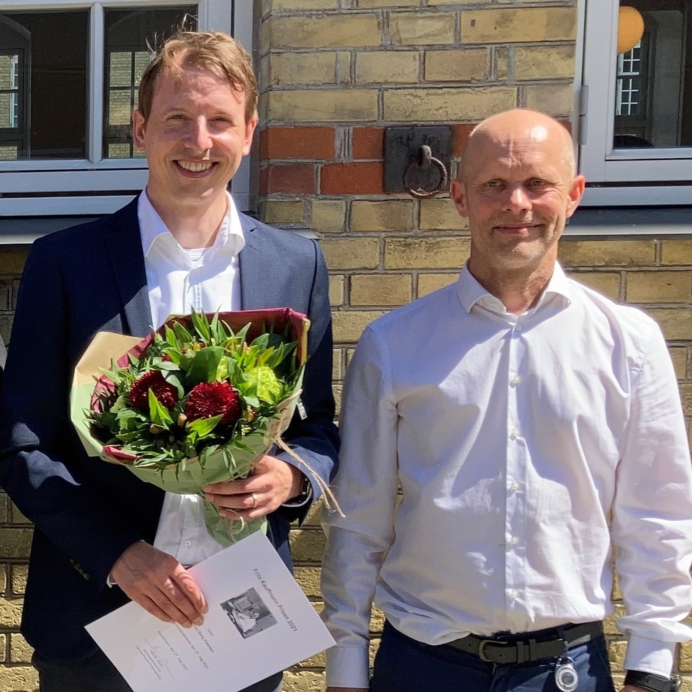 Michael Bang Petersen og direktør for Statens Serum Institut, Henrik Ullum.
